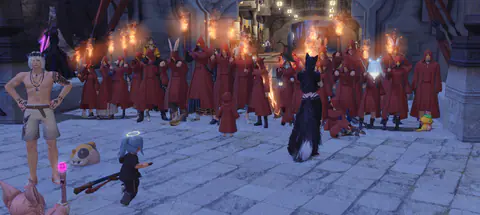 A crowd of FFXIV players in matching red robes gathered in a torch-lit circle at night.