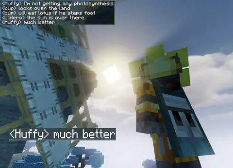 A Minecraft build with chat captions, ending in ‘<Huffy> much better’.